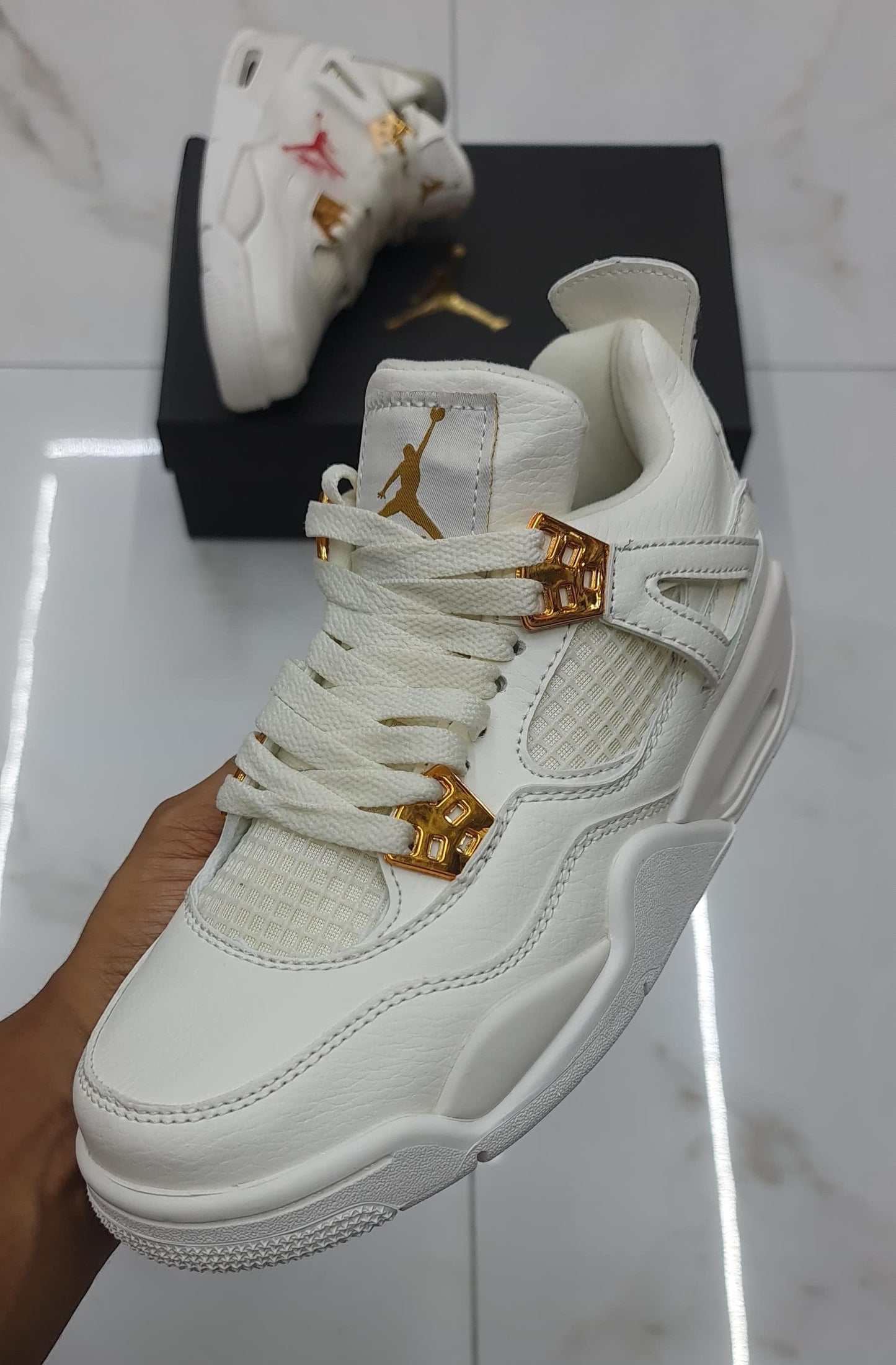 Jordan 4 Retro Metallic Orange